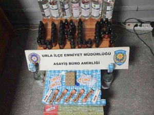 Urla’da kaçak içki ve sigara satışı yapan markete polis baskını