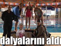 Kars’ta yüzmede dereceye girenler madalyalarını aldı