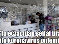 Kars'ta eczacıdan şeffaf branda ile koronavirüs önlemi