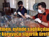 Öğretmen, evinde sağlıkçılar için yüz koruyucu siperlik üretiyor