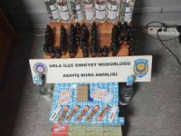 Urla’da kaçak içki ve sigara satışı yapan markete polis baskını