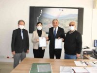 Hayırsever kardeşler arsalarını belediyeye bağışladı