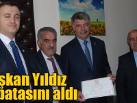 MHP'li Kağızman Belediye Başkanı Nevzat Yıldız mazbatasını aldı