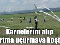 Karnelerini alıp uçurtma uçurmaya koştular