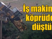 Kars'ta köprüden düşen iş makinesinin operatörü yaralandı