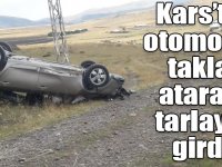 Kars’ta otomobil takla atarak tarlaya girdi