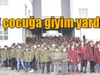 Karslı hayırsever mezun olduğu okuldaki 500 çocuğa giyim yardımında bulundu