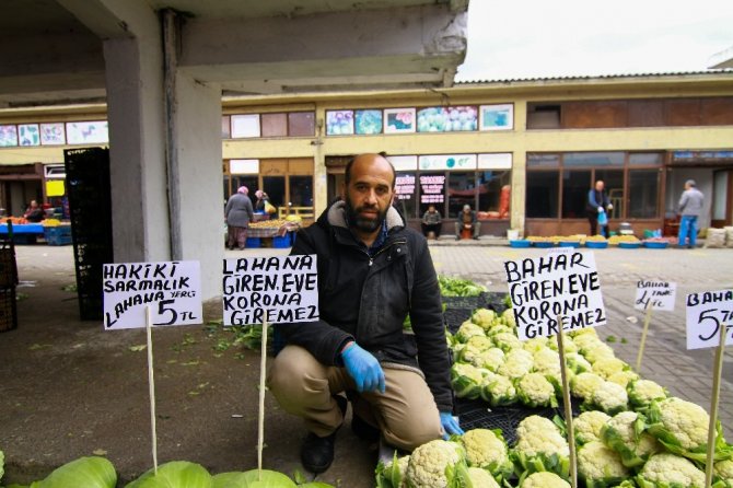 Pazarcı esnafından korona virüse ilginç pankart