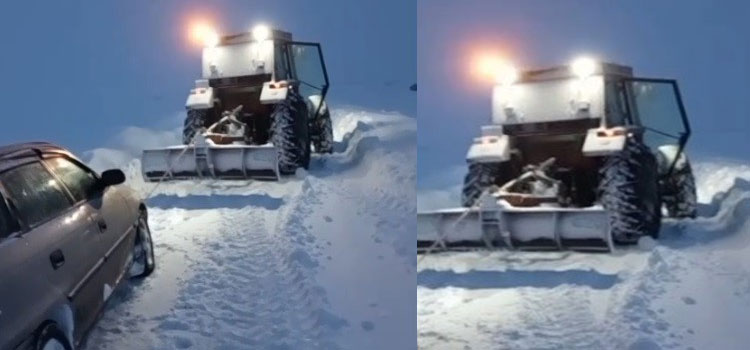Kars’ta kara saplanan aracı vatandaş traktörüyle kurtardı