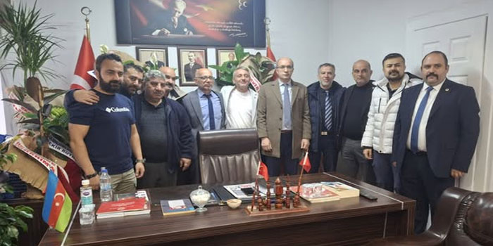 TÜRKAV Kars’tan MHP İl Başkanı Okyay’a hayırlı olsun ziyareti