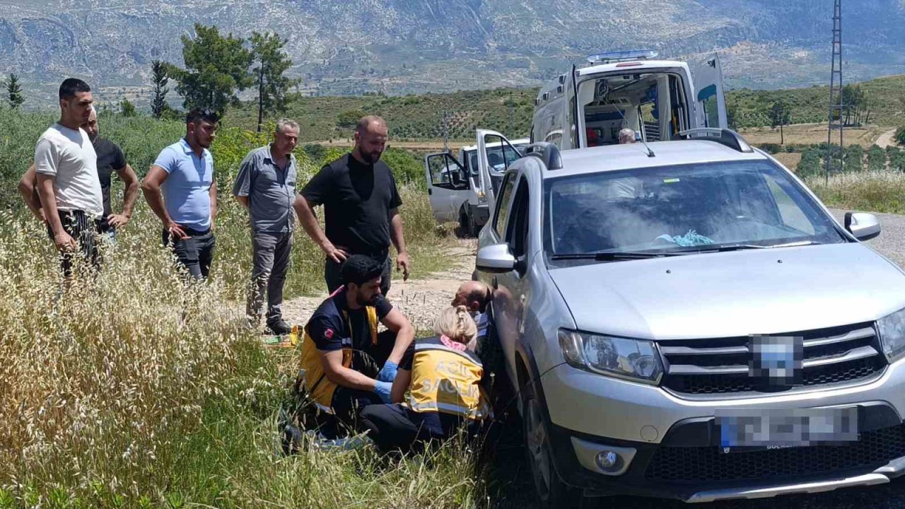 Devrilen traktörden kabin sayesinde yaralı kurtuldu