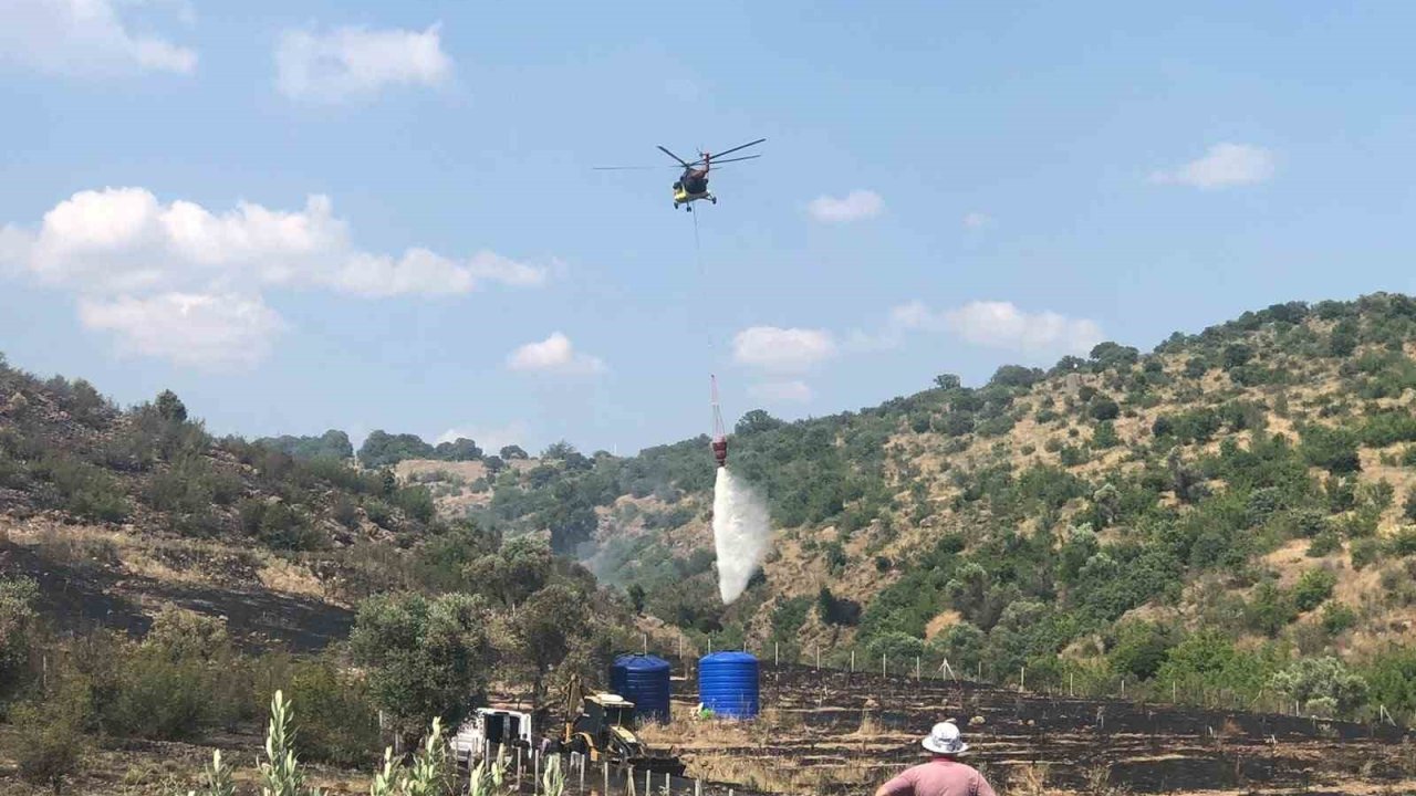 Makilik alanda başlayan yangın büyümeden söndürüld