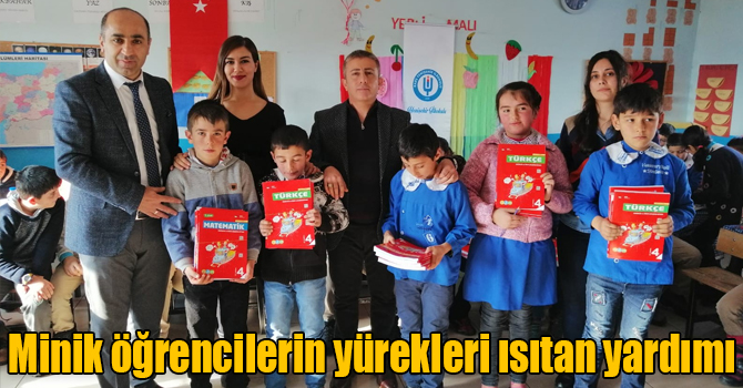 Karslı minik öğrenciler harçlıklarıyla köy okulundaki kardeşlerine hediye aldı