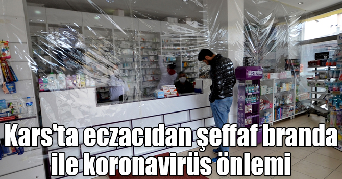 Kars'ta eczacıdan şeffaf branda ile koronavirüs önlemi