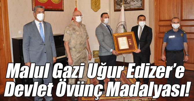 Malul Gazi Uğur Edizer’e Devlet Övünç Madalyası!