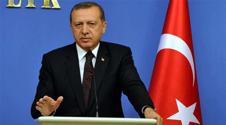Başbakan Erdoğan’dan Türk bayrağının indirilmesine sert tepki