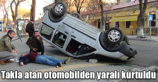 Takla atan otomobilden yaralı kurtuldu