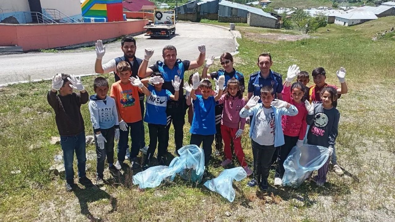 İlkokul öğrencileri polis ağabeyleriyle çevreyi temizledi