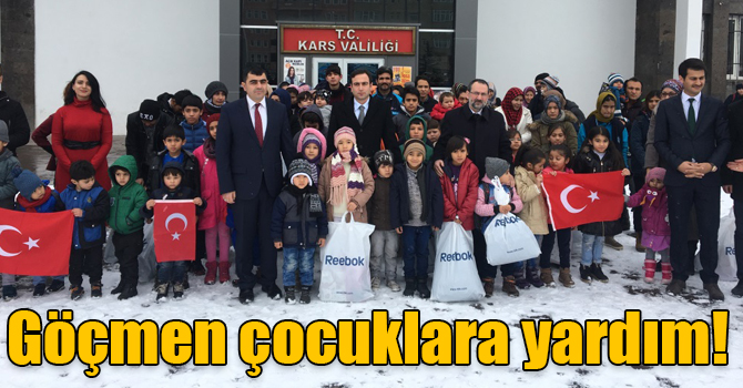 Kars’ta göçmen çocuklara kışlık yardım yapıldı