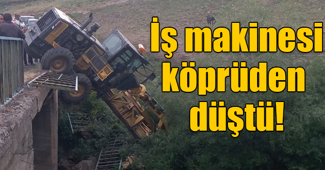 Kars'ta köprüden düşen iş makinesinin operatörü yaralandı