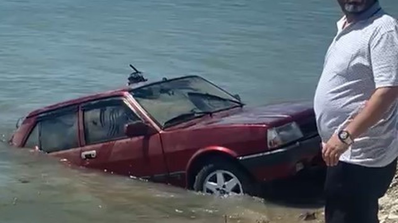 Sürücüsünün el frenini çekmeyi unuttuğu otomobili baraja uçtu