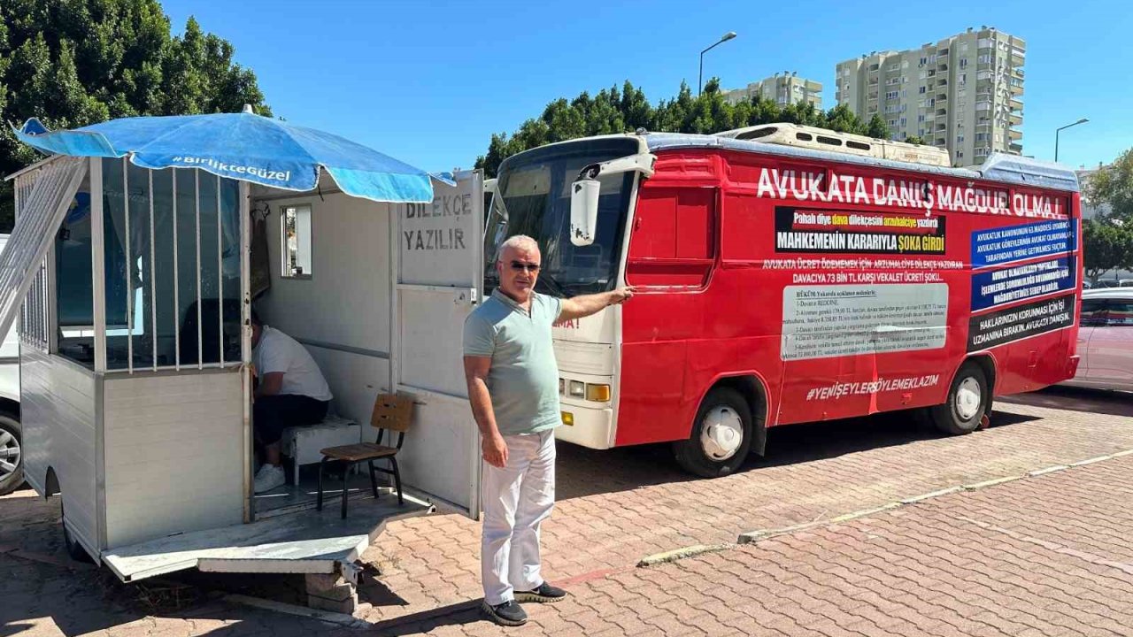 Adliye önünde üzerinde ‘Avukata danış, mağdur olma’ yazılı meçhul otobüs, arzuhalcileri kızdırdı