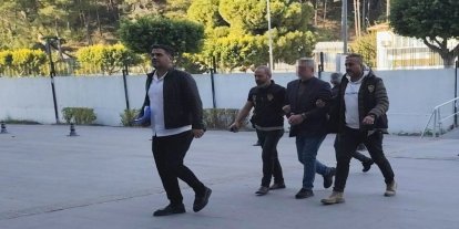 Antalya’da sahibi olduğu markette tartıştığı 2 kişiyi öldüren cinayet zanlısı adliyeye sevk edildi