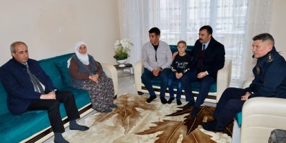 Şehit ailelerine anlamlı ziyaret