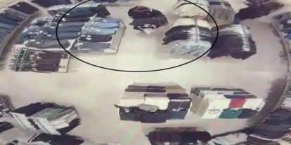 Mağazada alışveriş yaparcasına rahat davranan 118 suç kaydı bulunan şahıs, kabinde alarmları sökerken yakalandı