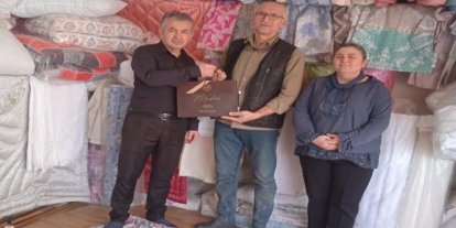 Tavşanlı’da 40 yılı aşkın esnafa ziyaret ve hediye
