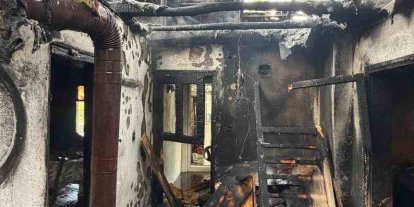 Yangında ev sahibi dumandan etkilendi, mahsur kalan kedi ekiplerce kurtarıldı