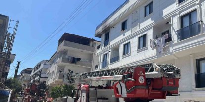 Yangında mahsur kalan hamile anne ve 2 çocuğu kurtarıldı
