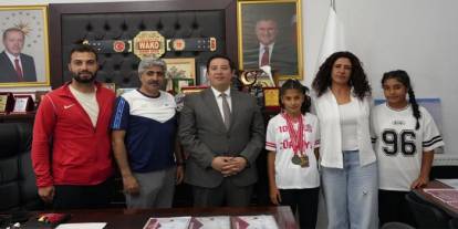 Türkiye Şampiyonu Ada Bozkuş’tan Kars Gençlik ve Spor İl Müdürü Mehmet Başköylü’ye Ziyaret