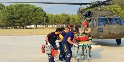 Kayalıklardan düşen doğa yürüyüşçüsü askeri helikopterle kurtarıldı