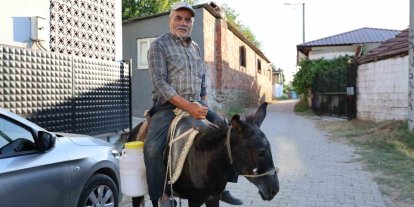 Ayhan amca yokluktan değil, sürücü belgesi olmadığından eşeği ile servis yapıyor