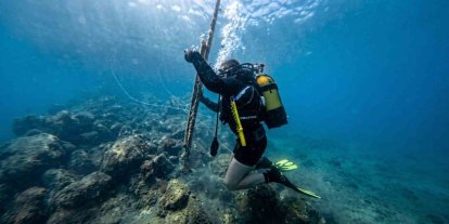 Güvercinada açıklarında deniz dibi temizliği yapıldı