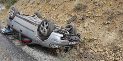 Takla atan otomobildeki 2 kişi ölümden döndü