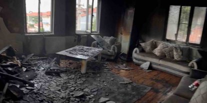 Yangında eşyaları kül olan aileye Sevgi Eli sahip çıktı