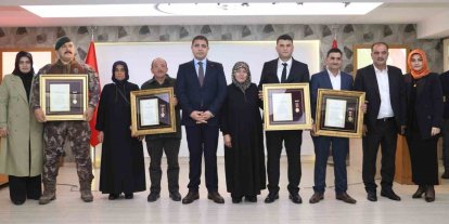 Şahit aileleri ve gazilere devlet övünç madalyası verildi