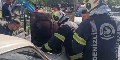 Park halindeki otomobilde çıkan yangını korkuttu