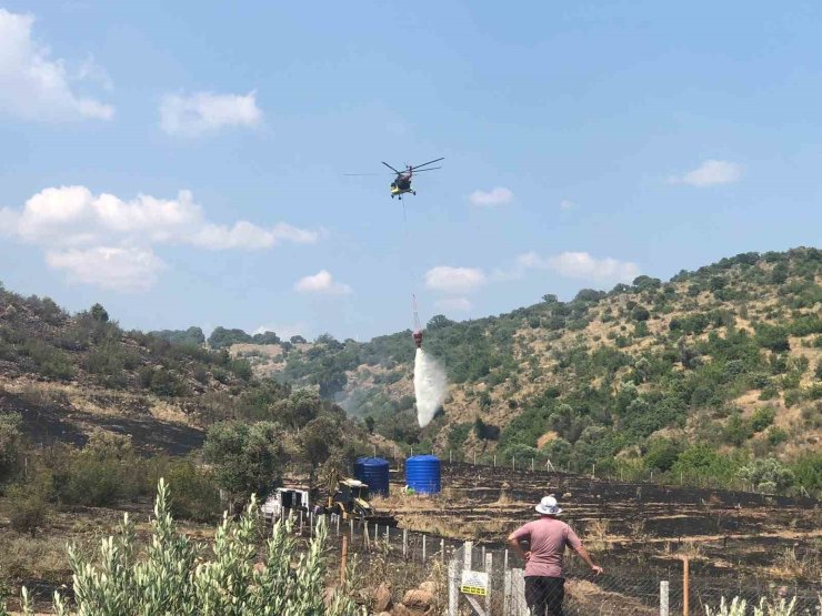 Makilik alanda başlayan yangın büyümeden söndürüldü