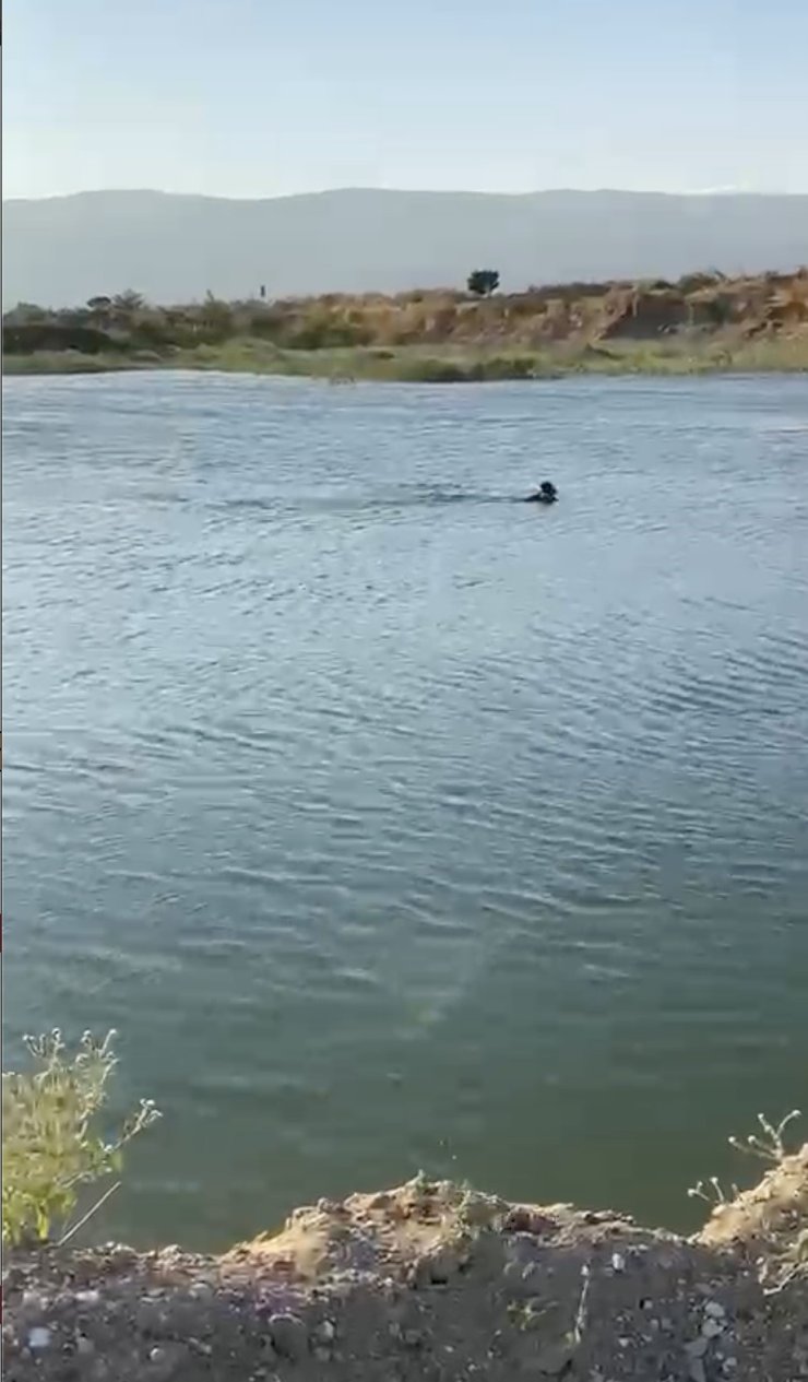 Serinlemek için girdiği göletten cansız bedeni çıktı