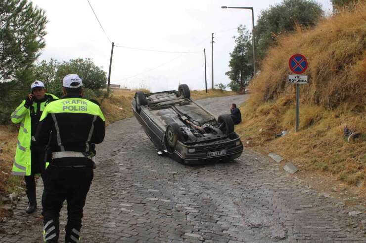 Freni tutmayan otomobil takla attı